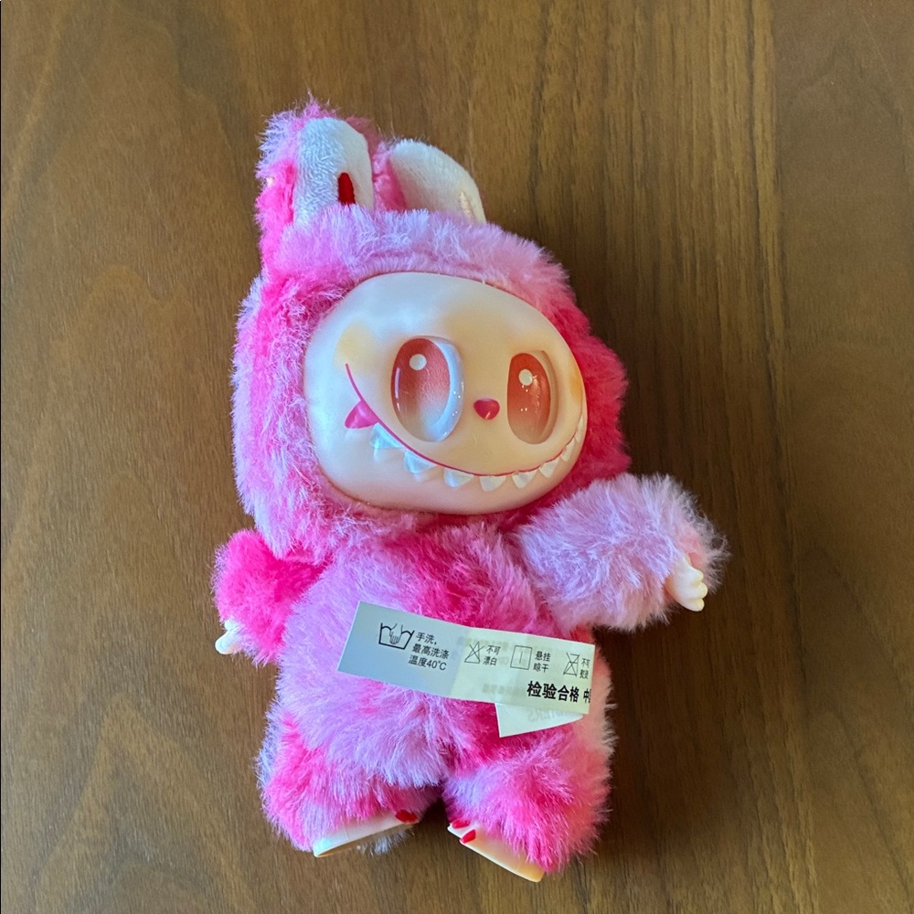 Fluffy Pink Monster Plush Toy